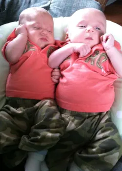 image of twins on boppy pillow