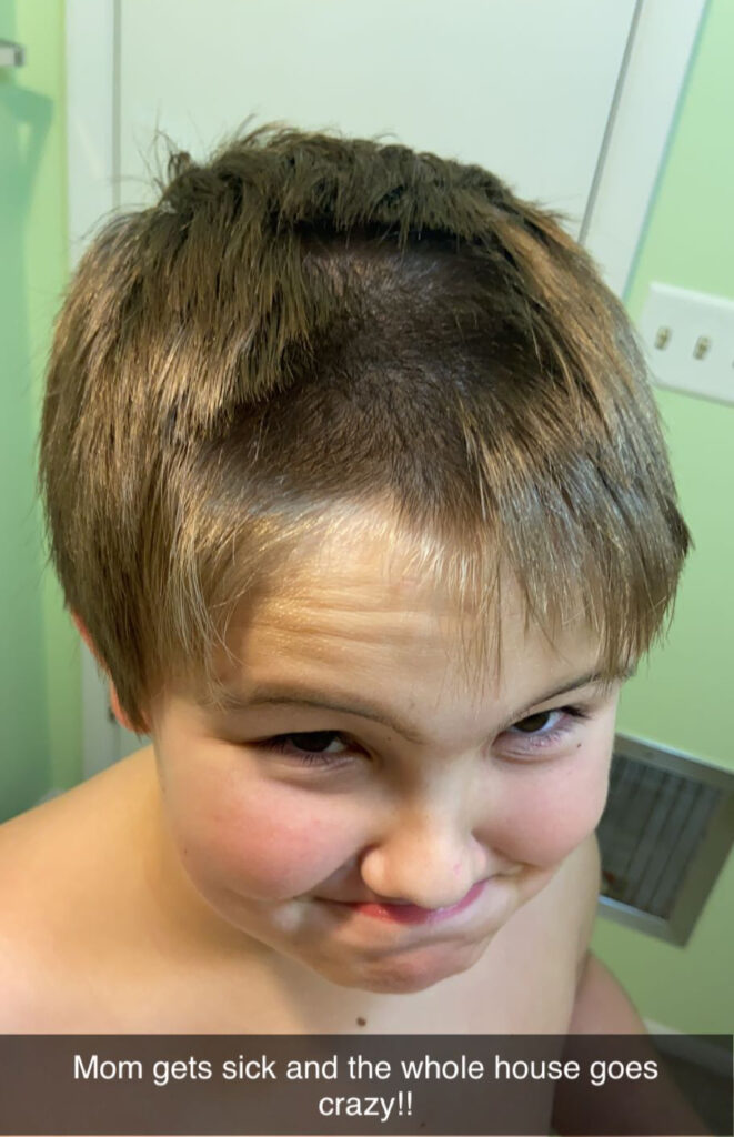 boy cuts his hair