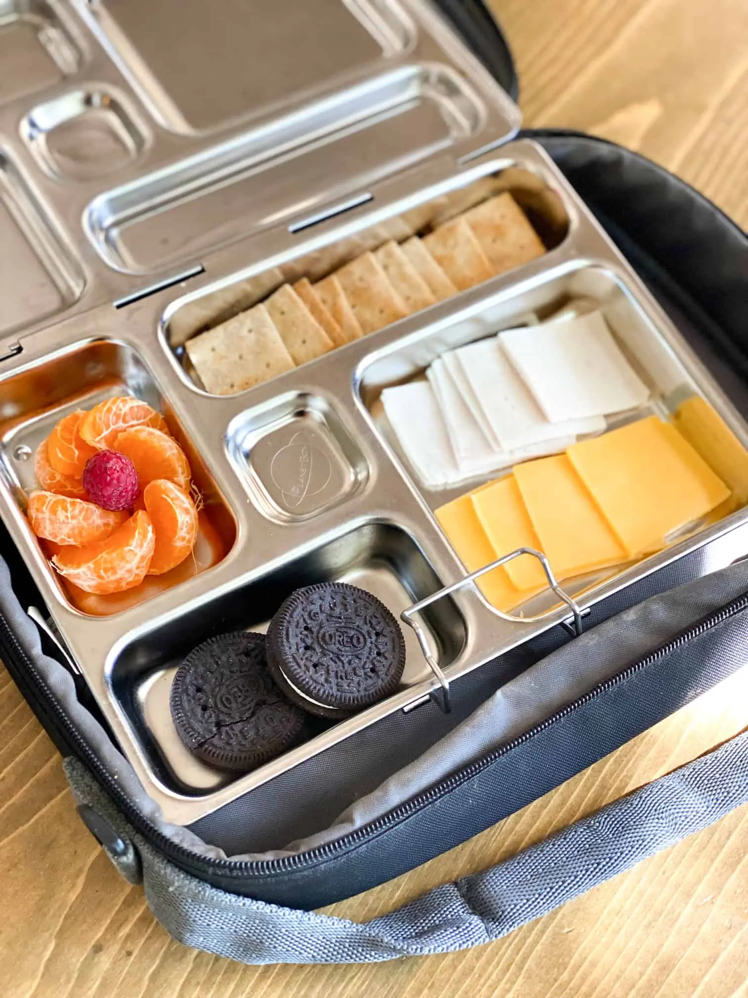 image of a diy lunchable in a tin bento box