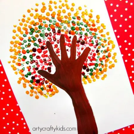 image of a painted handprint and dots for leaves