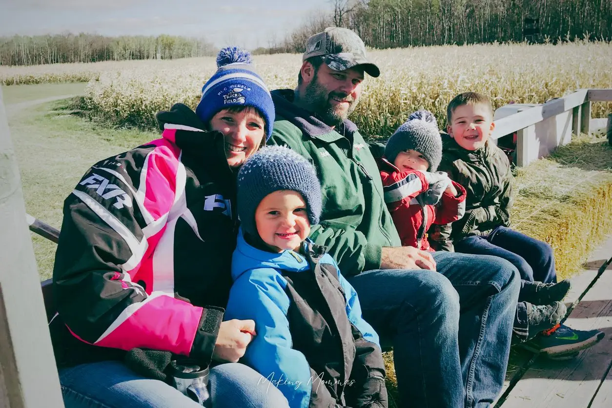 an image of a family on a hayride
