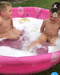 toddler bathing in the pool