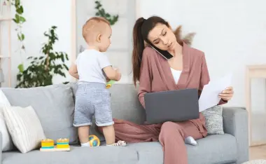 image of a mom working from home with toddler