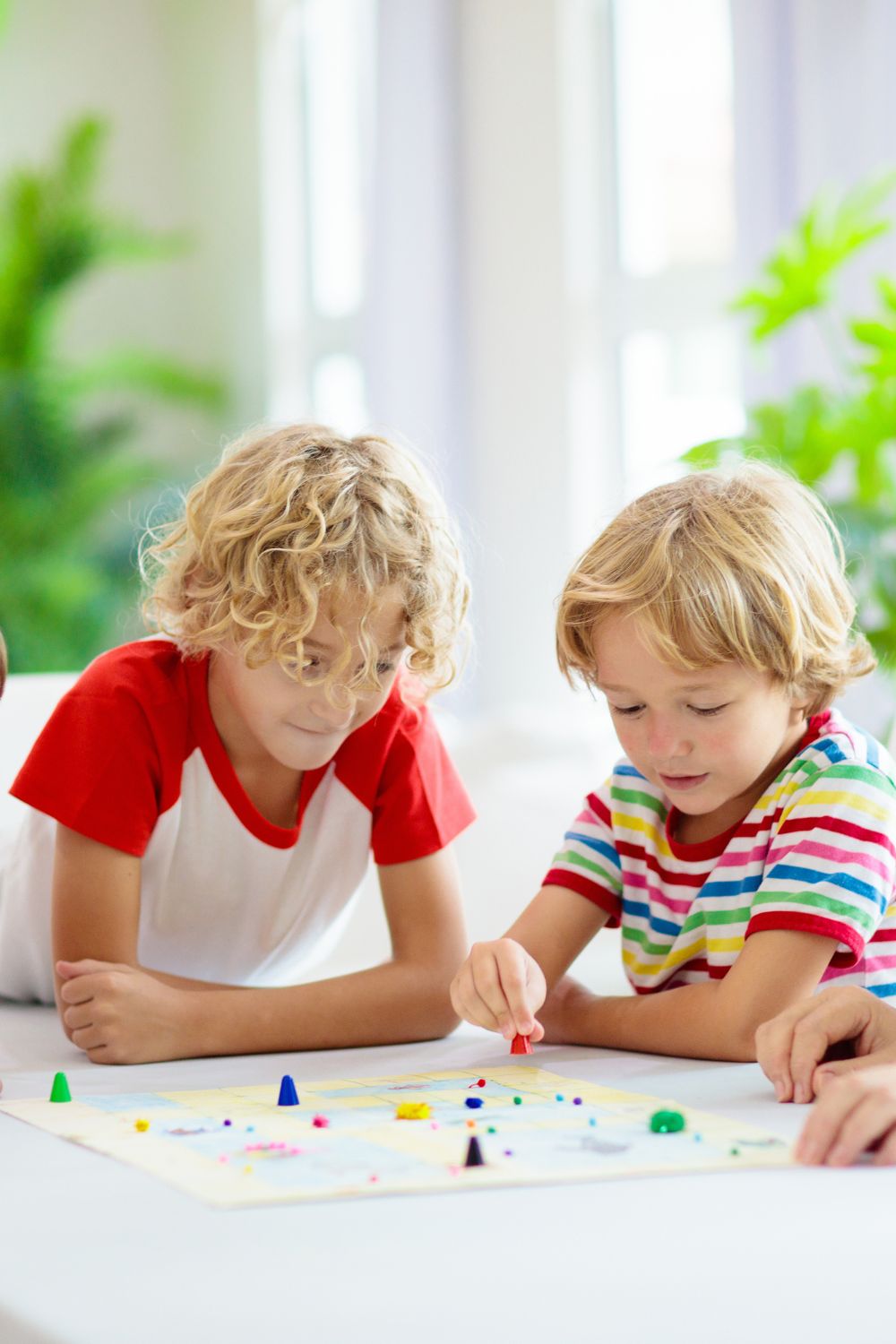 two boys playing a board game
