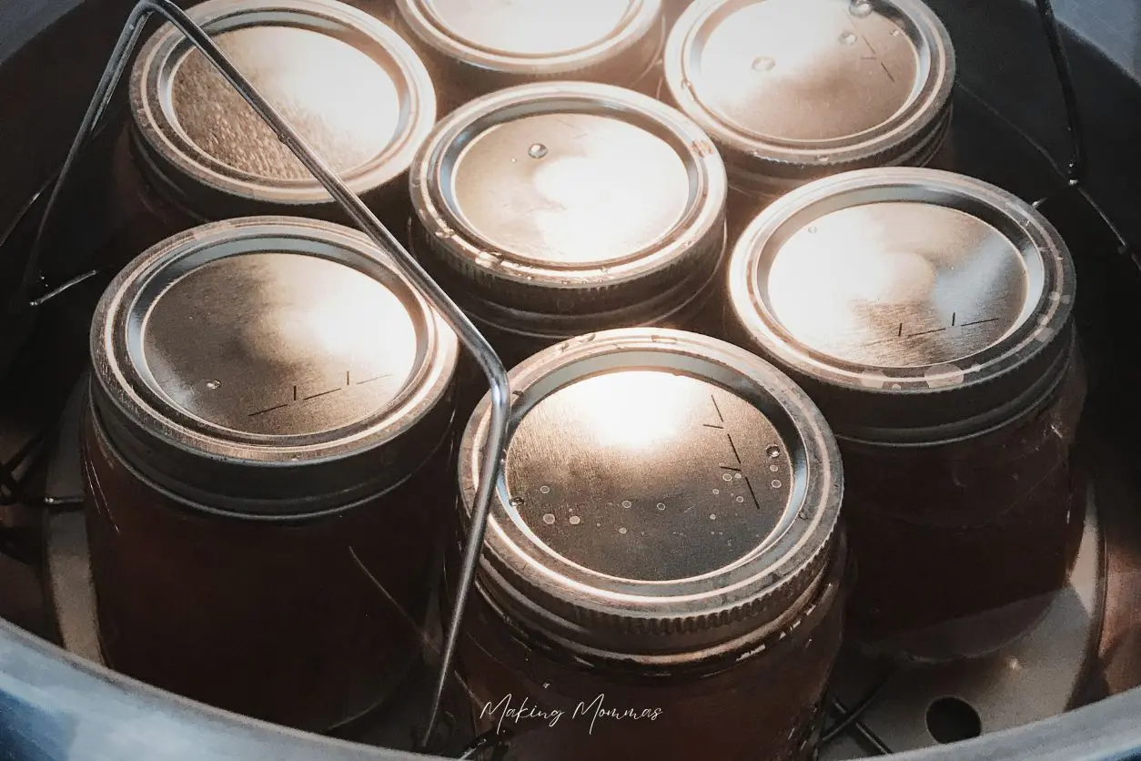 image of apple cider in a water bath