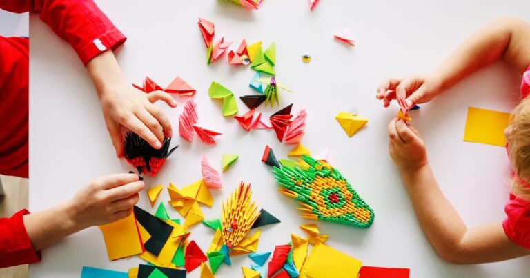 image of kids making paper origami