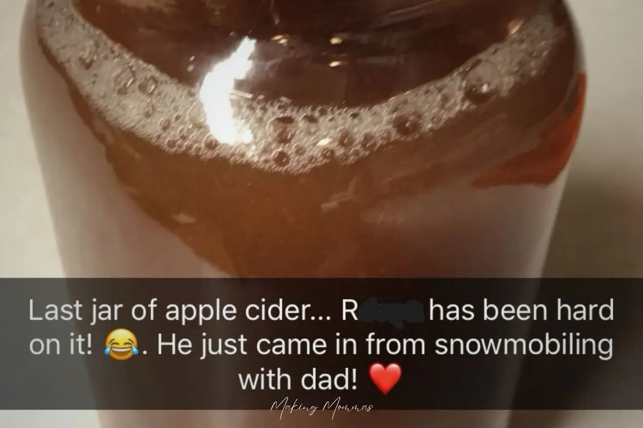 image of a jar of apple cider with text that reads "Last jar of apple cider.... R. has been hard on it! He just came in from snowmobiling with dad!"