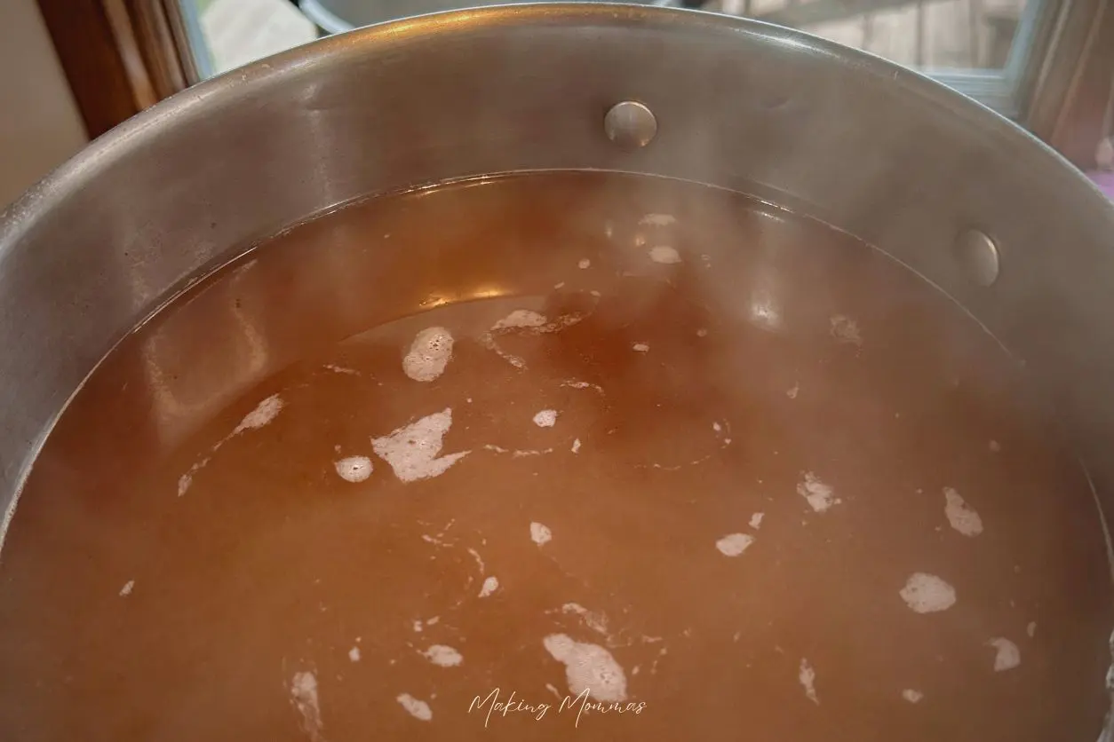 image of hot apple cider in a pot