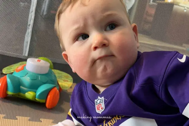 image of baby in vikings jersey