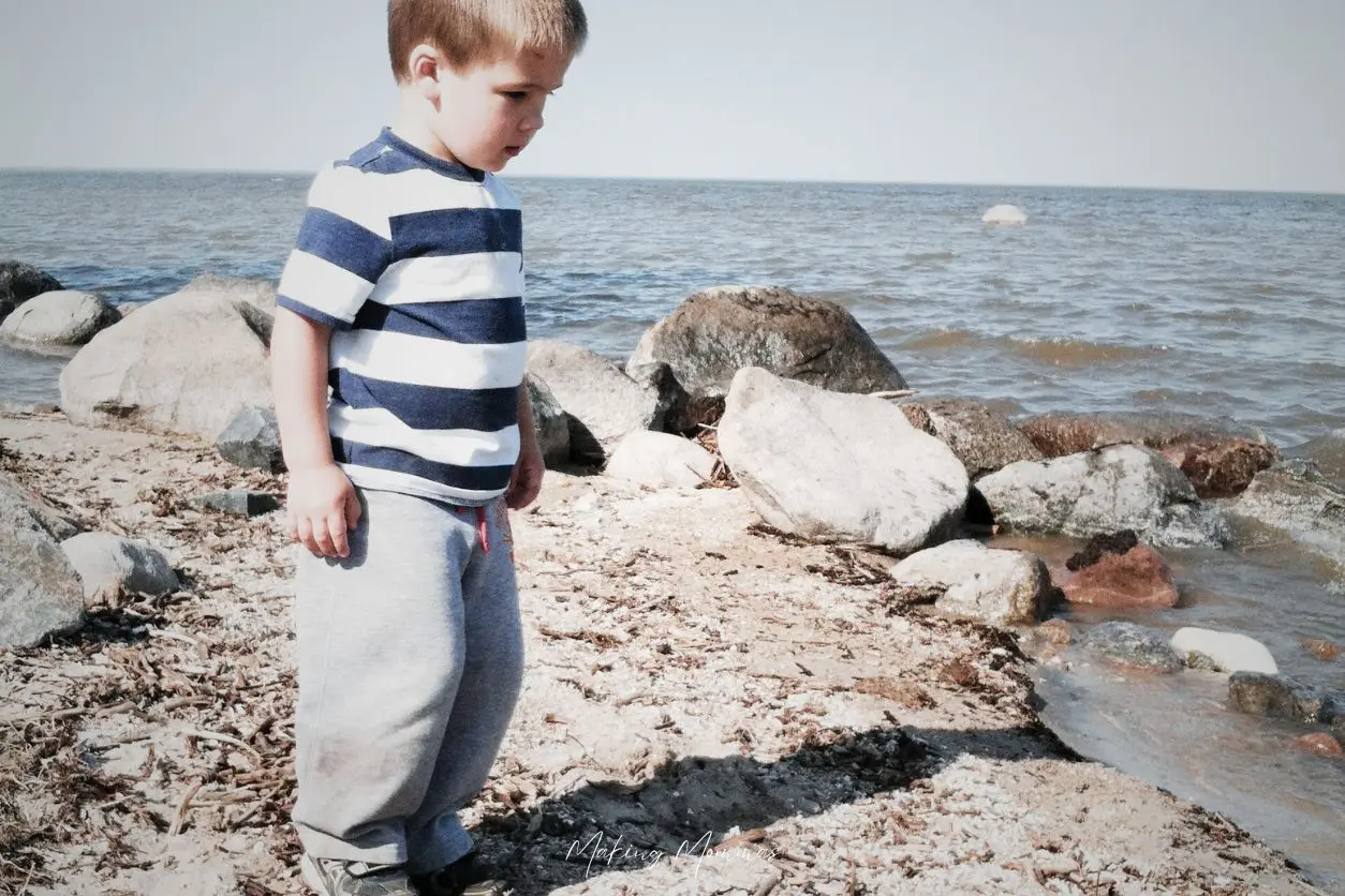 image of a boy on the beach