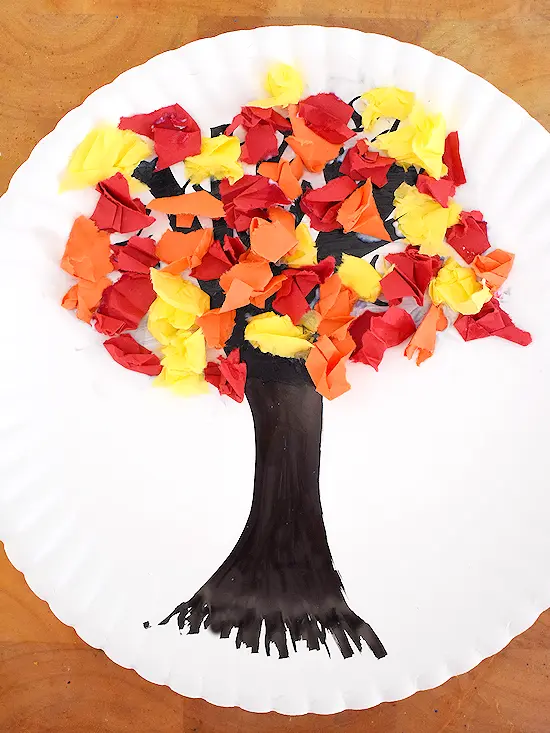 image of a fall tree on a paper plate with tissue paper leaves